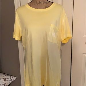 a yellow pink top